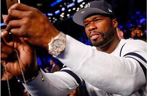 Watch! 50 Cent Punches A Female Fan Before Asking Her To Twerk Onstage